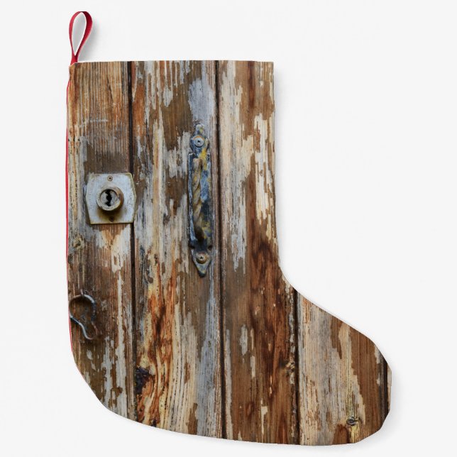 Closeup photo of brown wooden board small christmas stocking (Front)