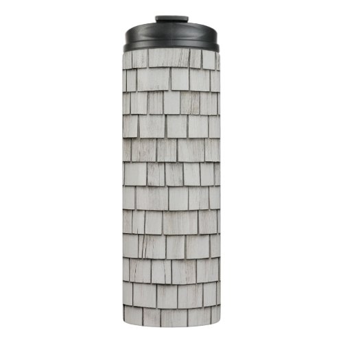 Closeup photo of gray roof shingles thermal tumbler