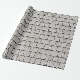 Closeup photo of gray roof shingles wrapping paper
