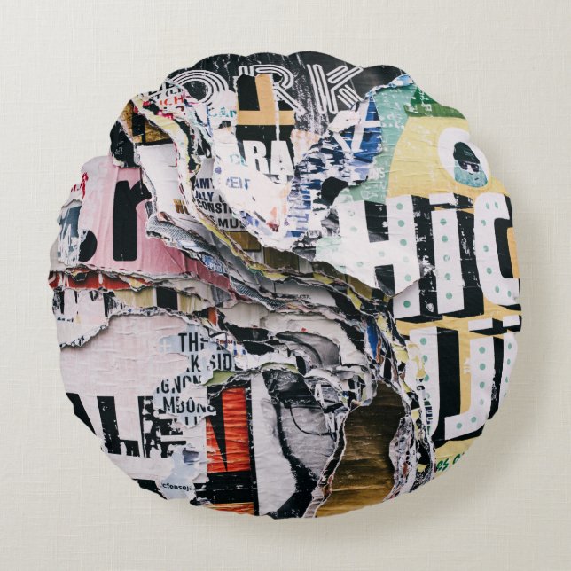 Closeup photo of torn papers round pillow (Front)