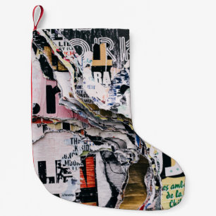 Closeup photo of torn papers small christmas stocking