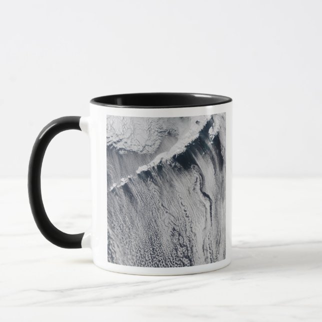 Cloud patterns visible over the Aleutian Island Mug (Left)
