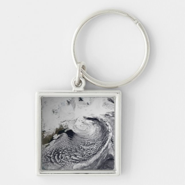 Cloud simulation of a single day 3 keychain (Front)