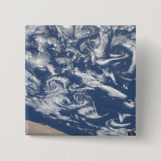 Cloud vortex streets off the coast button (Front)