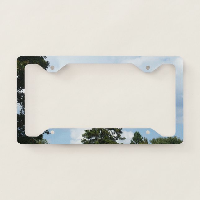 Clouds in Blue Sky and Pine Trees License Plate Frame (Front)