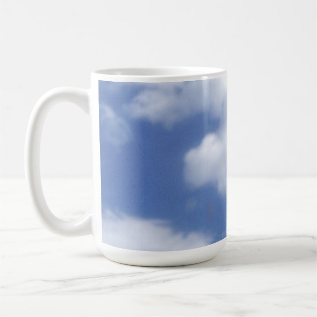 clouds in blue sky coffee mug (Left)