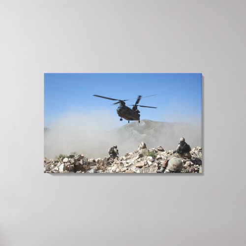 Clouds of dust kicked up by the rotor wash canvas print