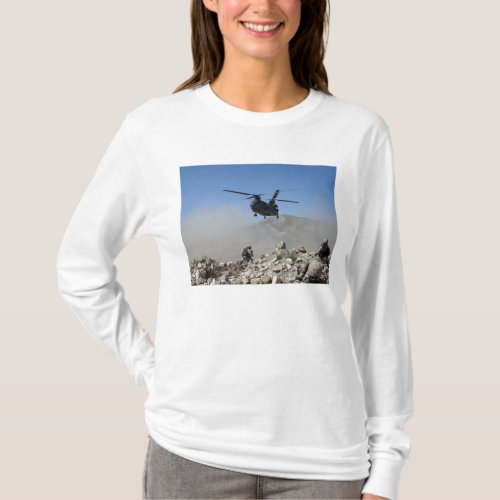 Clouds of dust kicked up by the rotor wash T_Shirt