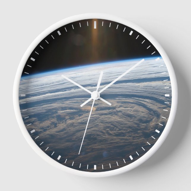 Cloudy Formations In The South Indian Ocean. Clock (Front)