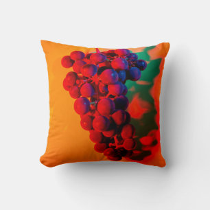 Cluster of blue grape in orange neon light. Food b Throw Pillow