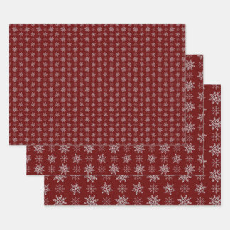 Cluster of Snowflakes on Deep Red Wrapping Paper Sheets