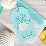 Coastal Beach Christmas Aqua Blue Gift Tags<br><div class="desc">These personalized gift tags feature a white sand dollar and 2 white starfish on glitter coral,  with an aqua blue background,  and beachy holiday message “seas & greetings.” *If you would like this design on more products or need design help,  please contact me through Zazzle Chat.</div>