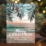 Coastal Beach Christmas Holiday Card<br><div class="desc">Sunset beach christmas holiday card featuring a sandy beach setting with lush palm trees,  string twinkle lights,  seasons greetings,  and your name.</div>