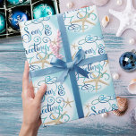 Coastal Beach Christmas SEAS & GREETINGS Wrapping Paper<br><div class="desc">Wrap your Christmas holiday gifts in coastal or beach flair using this roll of wrapping paper featuring a SEAS & GREETINGS elegant calligraphy script typography design accented with starfish in turquoise aqua blue on your choice of background color (shown with a light blue color). ASSISTANCE: For help with design modification...</div>