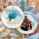 Coastal Beach Sea Turtle Mele Kalikimaka Photo Ceramic Ornament<br><div class="desc">This Hawaiian tropical coastal themed holiday ornament is easily personalized with family name on the front and a photo on the back, and features a watercolor turquoise blue sea turtle on an abstract beach background with a faux gold glitter sparkly wave, and gold Mele Kalikimaka. Check out the collection for...</div>