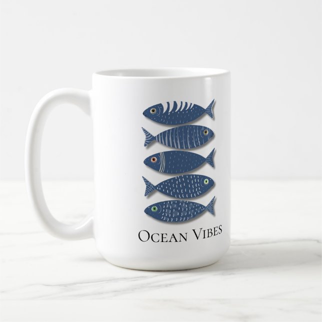 Coastal Blue Fish Pattern on Beige Background Coffee Mug (Left)