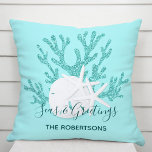 Coastal Christmas Beach Personalized Throw Pillow<br><div class="desc">Personalize this beachy Christmas pillow with aqua blue glitter coral,  white sand dollar and starfish,  and the holiday message “Seas & Greetings”,  on a light aqua blue background.
*If you would like this design on more products or need design help,  please contact me through Zazzle Chat.</div>