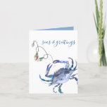 Coastal Christmas Blue Watercolor Crab Beach Card<br><div class="desc">This Coastal theme holiday card features a replica of my original hand painted watercolor crab with Christmas lights in shades of red, green, blue and turquoise on a crisp white background. The words Seas and Greetings are set in a modern brush script typography. The inside features a solid berry red...</div>
