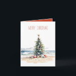 Coastal Christmas on the Beach Note Card<br><div class="desc">This coastal inspired Christmas card features a Christmas tree decorated on the beach.  Personalize the Merry Christmas on the front and the text on the inside with your own holiday greetings.</div>