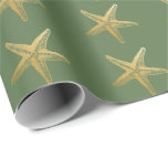 Coastal Christmas Starfish on Green Wrapping Paper<br><div class="desc">Beautiful starfish theme wrapping paper for Christmas at the beach! An elegant gold starfish on holiday green for the prettiest coastal Christmas wrapping theme you can find! Pair with another color from our collection for a coordinated designer look under the tree this year.</div>