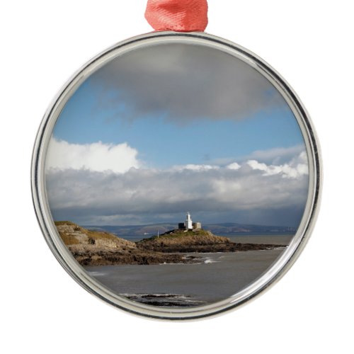 Coastal landscape and lighthouse metal ornament