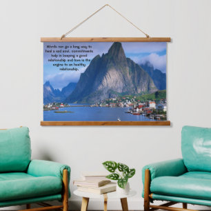 Coastal mountain view with a calm blue sea  hanging tapestry