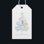 Coastal Ocean Beach Seashell Christmas Tree Gift Tags<br><div class="desc">Who needs snowflakes when you have seashells! Capture a cool nautical casual and coastal vibe this holiday sea-son with our coastal seaside-inspired holiday Christmas collection. We've hand-painted beautiful watercolor ocean seashells in splashes of coastal blue, rosy pink, sandy white, teals, and peach shades to create a calm coastal vibe to...</div>