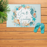Coastal SEAS & GREETINGS Seahorse Shells Doormat<br><div class="desc">Coastal, beach or tropical Christmas holiday season doormat featuring watercolor seahorses, starfish, shells and ornaments accented with faux glitter icons and the greeting SEAS & GREETINGS in modern handwritten script typography in turquoise, teal, golden brown and white on your choice of background color (shown in light turquoise). Personalize in EDIT....</div>