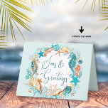 Coastal SEAS & GREETINGS Seahorse Shells Holiday Card<br><div class="desc">Coastal, beach or tropical Christmas holiday card featuring the greeting SEAS AND GREETINGS in modern handwritten script typography and watercolor seahorses, starfish, shells and ornaments in turquoise, teal, golden brown and white accented with faux glitter and your custom message inside. OPTIONS: The sample is shown on the 4x5.6" satin card--5x7...</div>