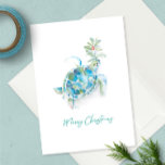 Coastal Watercolor Sea Turtle Beach Christmas Card<br><div class="desc">This beach theme holiday card features my original hand painted watercolor sea turtle with holly and red berries in shades of tropical colors on a crisp white background. The words Merry Christmas are set in a modern brush script typography. The inside features a solid turquoise blue color with your custom...</div>