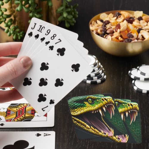 Cobra snake with vibrant green and yellow scales  playing cards