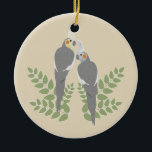 Cockatiel Couple Ceramic Ornament<br><div class="desc">Romantic cockatiel couple with leaves. customizable background color.</div>