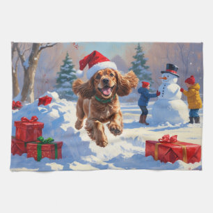 Cocker Spaniel Running in Snow with Christmas Hat Kitchen Towel