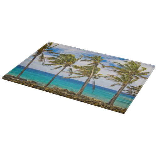 Coconut palm trees Cocos nucifera swaying in Cutting Board