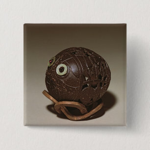 Coconut sculpted into a face, c.1895 button