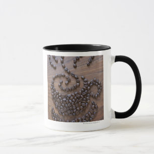 Coffe cup illustrated using coffee beans