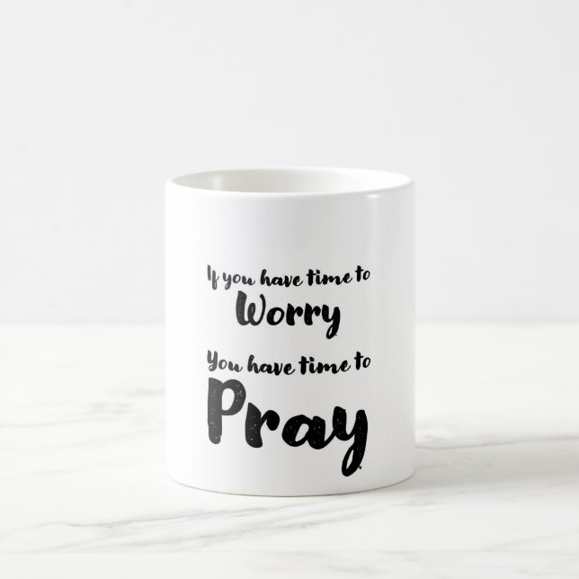 Coffee mug reminds us to stop worrying and pray. (Center)
