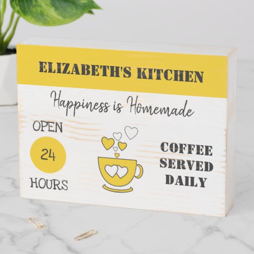 Coffee served daily open 24 hours yellow wooden box sign