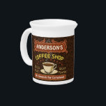Coffee Shop with Mug Create Your Own Personalized Beverage Pitcher<br><div class="desc">This coffee-themed pitcher is perfect for anyone who runs their own coffee shop or has a coffee theme in their home kitchen decor. Done in retro brown, orange, beige and yellow, this espresso / cappuccino inspired design features a cup on a saucer, two personalized text banners and the words "Coffee...</div>