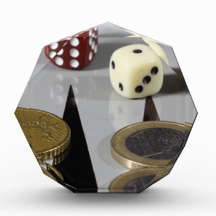 Coins on a backgammon board award