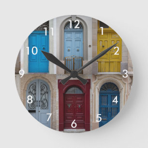 Collage of colorful front doors round clock