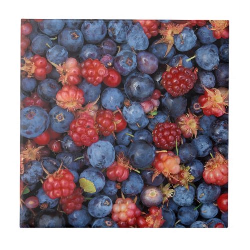 Collage of Wild Berries Blueberries Raspberries Tile