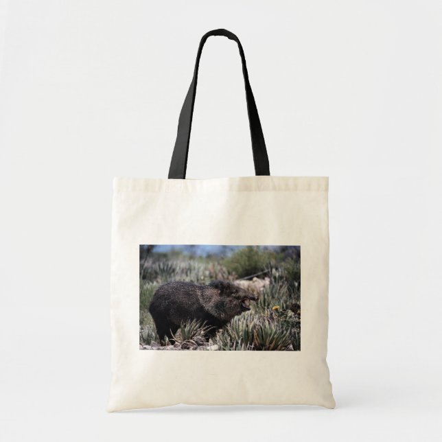 Collared peccary (javelina) yawning amid flowering tote bag (Front)