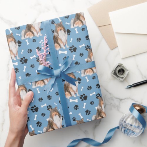 Collie Dog Paw Print Pattern on Blue Wrapping Paper