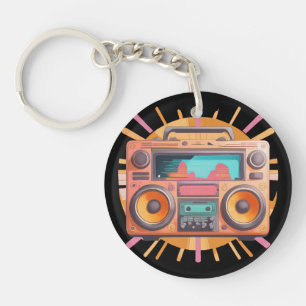Coloful retro 80s boombox with a sunburst in the. keychain