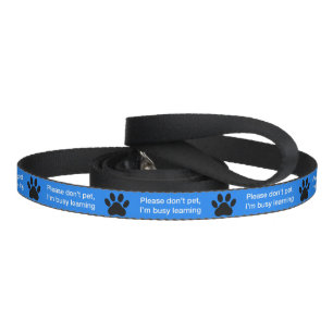 Color-coded dog paw print blue in training pet leash
