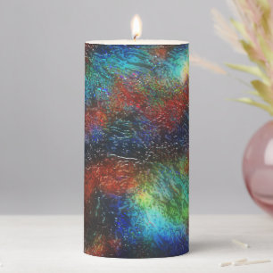 Colored dark stained texture under raw glass throw pillar candle