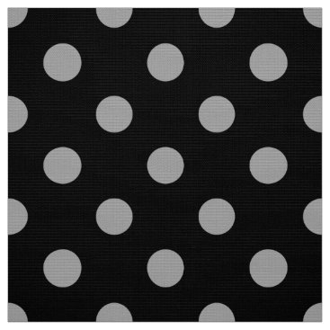 colored dots on black pattern fabric