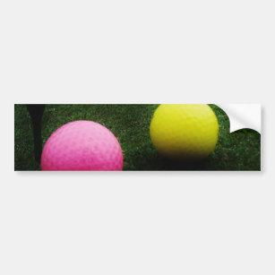 colored golf balls and cart bumper sticker