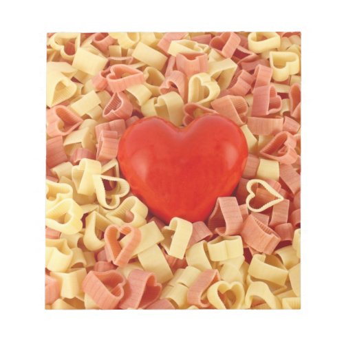 Colored pasta in form of heart notepad